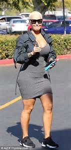 amber rose showcases her curves in skintight mini dress during shopping trip daily mail online