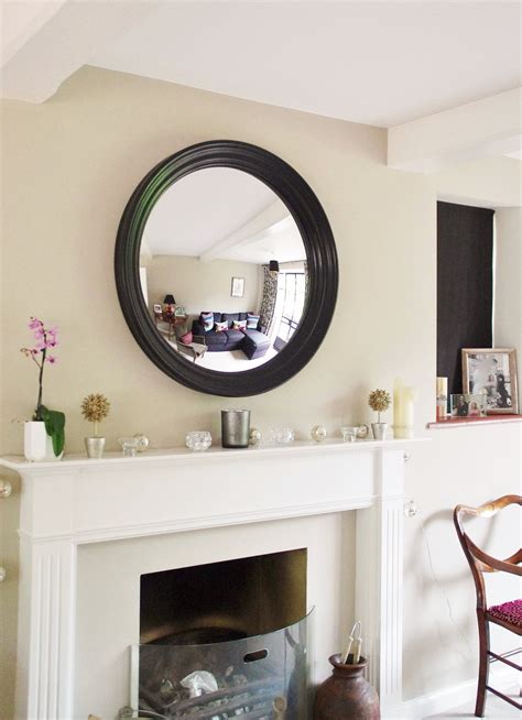 essential tips  hanging   mirror   fireplace omelo