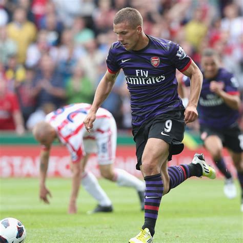 lukas podolski finds his feet out on the wing for arsenal bleacher