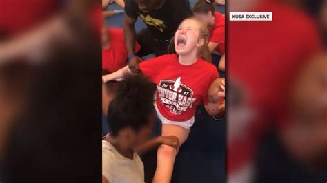 disturbing videos show denver high school cheerleaders forced into