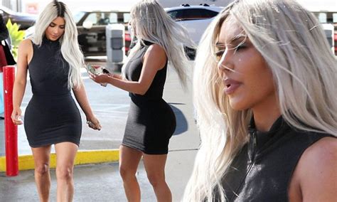 kim kardashian covers killer curves in tight black dress daily mail online