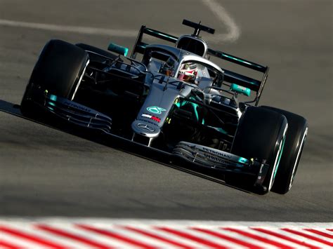 f1 lewis hamilton recovers from spin as ferrari continue