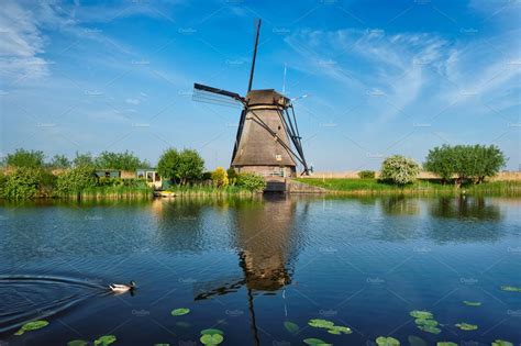 windmills  kinderdijk  holland graphics creative market