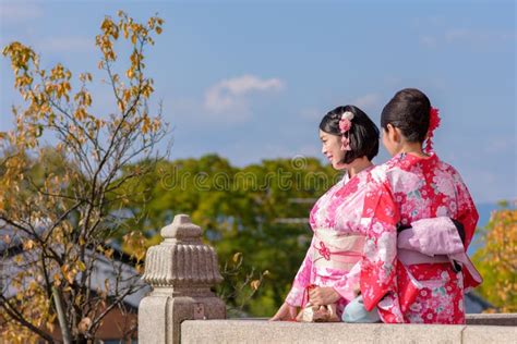 Japanese Girls Dressed In Kimonos At Kiyomizu Dera Temple In Kyoto