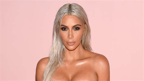 Kim Kardashian Shares Flashback Nude Shot Of Herself Wrapped In Bed