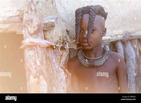 Himba Girl With Two Braids And Jewellery Portrait Himba Hut Himba