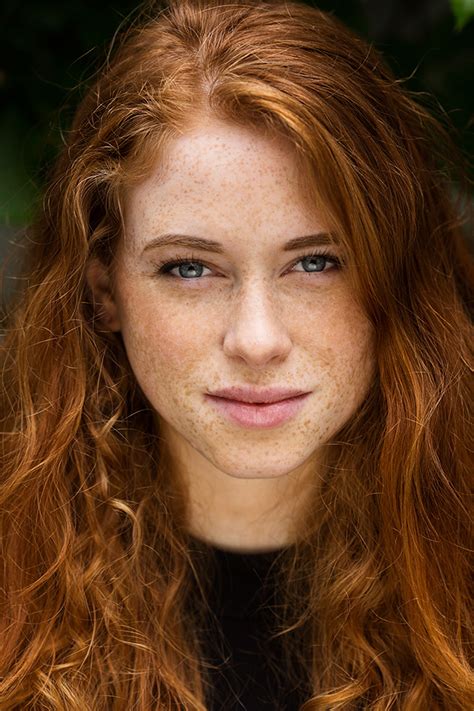 a photographer is documenting beautiful redheads around the world