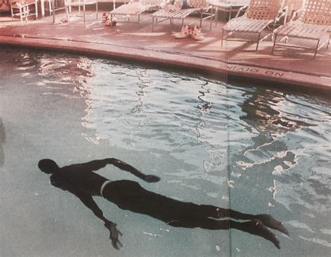 years  ers center manute bol takes  swim   hotel pool credit  scoopnestcom
