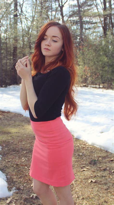 march 11 redhead in business attire pink