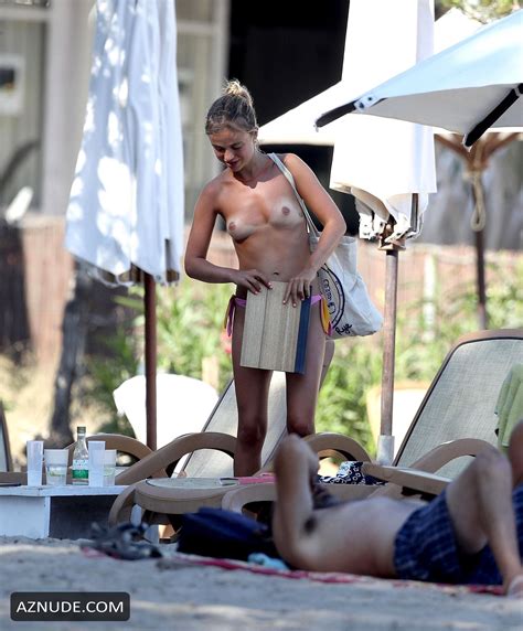 amelia windsor topless while reading a book and sunbathing