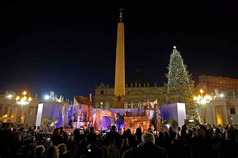 vatican christmas tree   traditional crib  lit    ceremony  saint peters