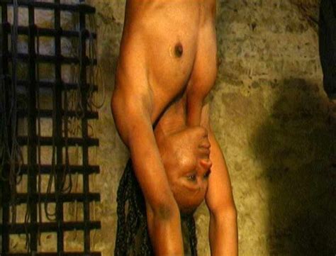 upside down torture of witch bdsm inquisition and interrogation pics