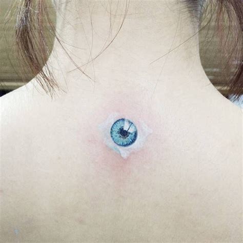 Cillian Murphys Blue Eye Tattoo On The Upper Back Tattoo