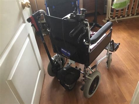 wheeltech enigma lightweight folding wheelchair  assistants power pack  woking surrey