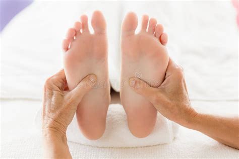 Cropped Image Of Woman Receiving Foot Massage Stock Image Image Of