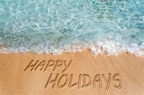 happy holidays sign   beach sand stock image colourbox