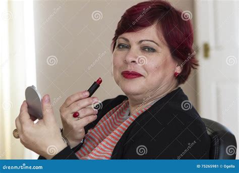 Mature Woman With Mirror And Lipstick Stock Image Image Of Posing