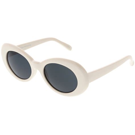 large retro mod white oval sunglasses with thick frame colored lens wi