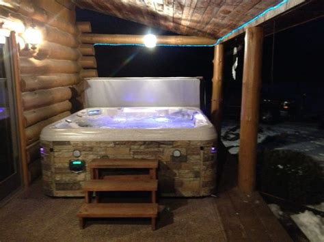 spa  rustic cabin rustic cabin outdoor decor tub