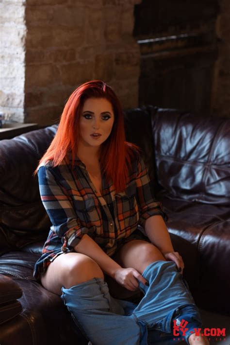lucy vixen blue panties on the leather couch curvy erotic