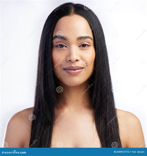 Straight Hair Is Easier To Manage Shot Of An Attractive Young Woman