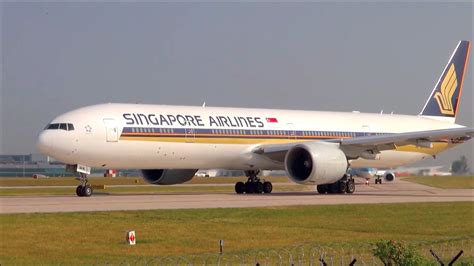 singapore airlines boeing  er beautiful takeoff  manchester