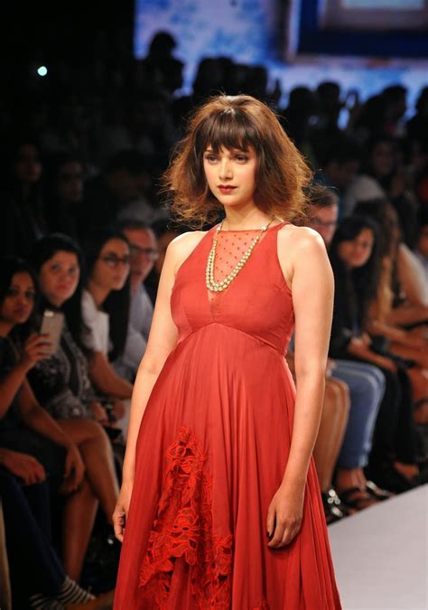 high quality bollywood celebrity pictures aditi rao hydari looks super sexy in red dress as she