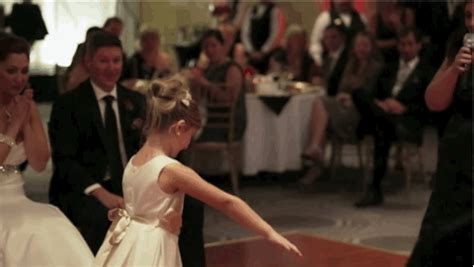 this flower girl and her mom singing love is an open door