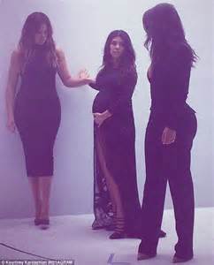Mamma Mia Kourtney Kardashian Cradles Bump At Photo Shoot While Kim