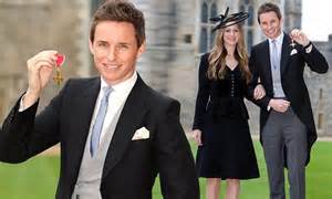 eddie redmayne beams with pride beside wife hannah as he s made an obe at windsor castle daily