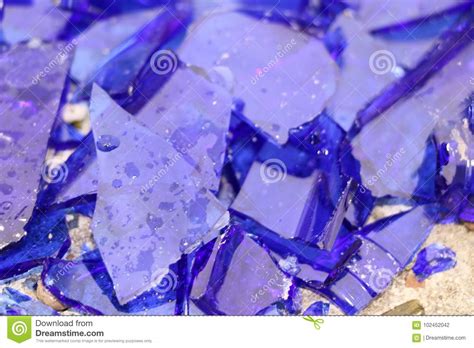Blue Broken Glass On A Concrete Surface Texture For A Background