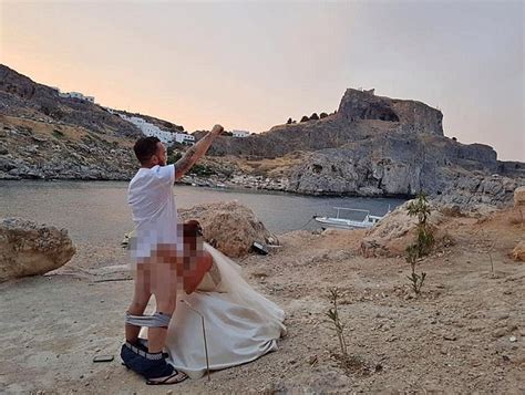 british couple who performed sex act in wedding photo at greek monastery face being sued after