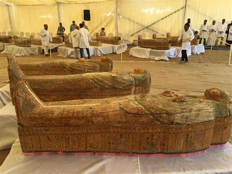 egypt unveils trove  ancient coffins excavated  luxor