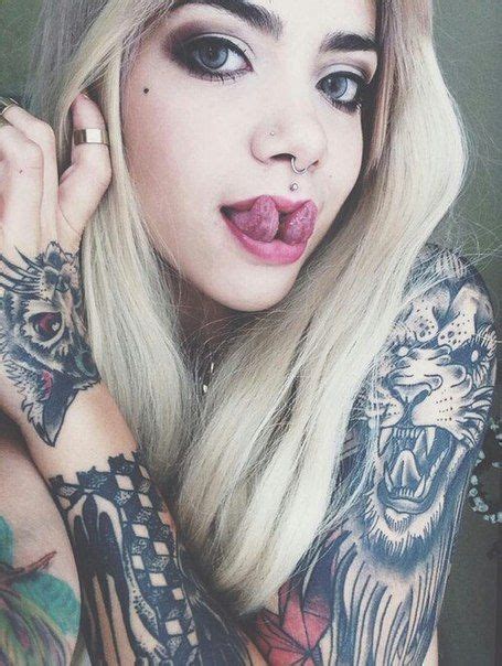 tattoos piercings split tongue on a cute girl girl