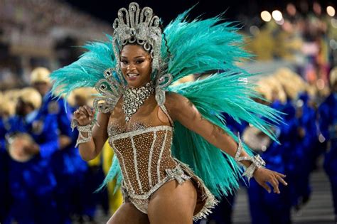 rio carnival  night  glitzy parades tackle  issues