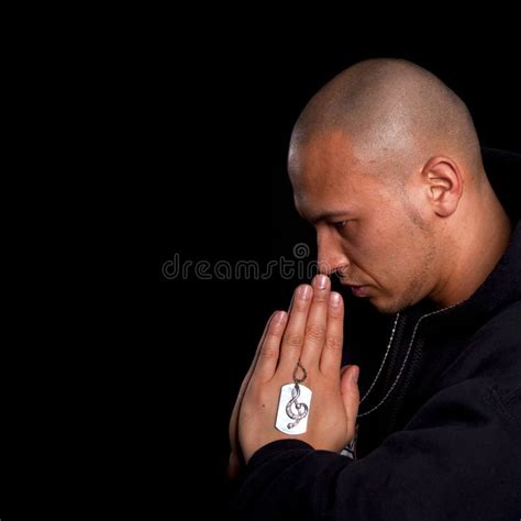 young man praying stock photo image