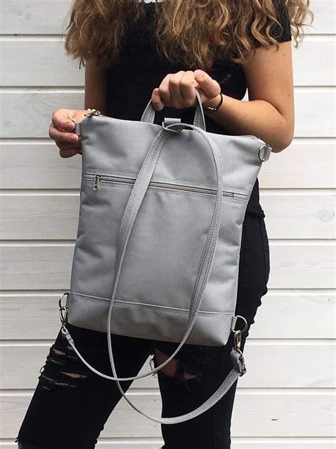womens customizable cross body backpack aris bags