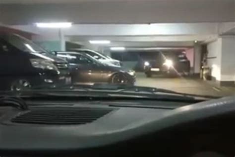 frustrated motorists wait eight minutes for hopeless driver to park in