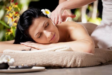 Young Attractive Woman Receiving Massage At Spa Resort