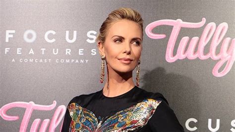 charlize theron says she gained 50 pounds for tully