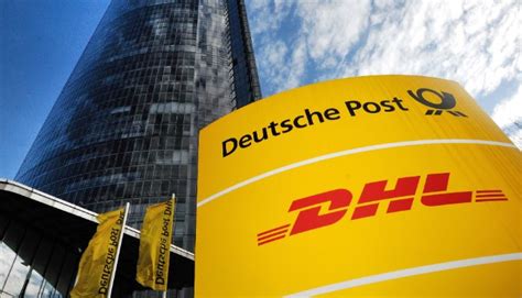 deutsche post dhl group pledges   emissions logistics   construction business news