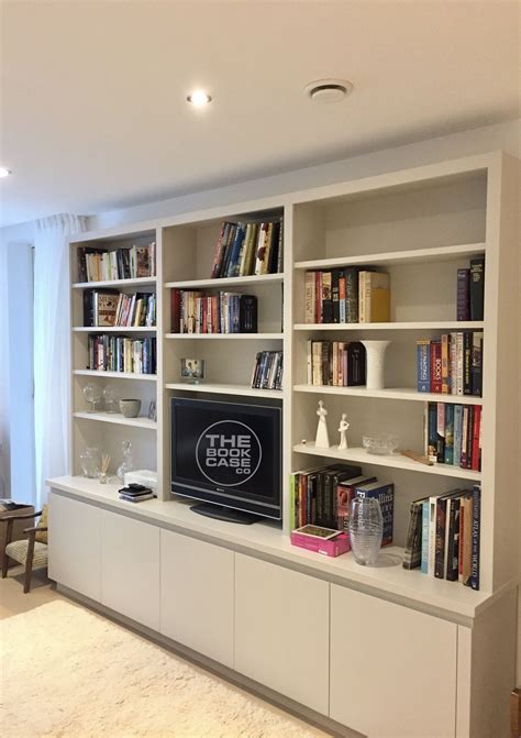 hand built media storage unit  shelving  cupboard areas wall