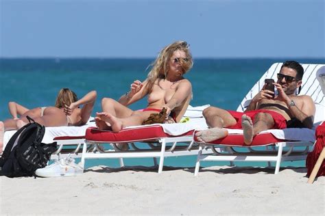 toni garrn sunbathing topless on the beach in miami 5372 celebrity