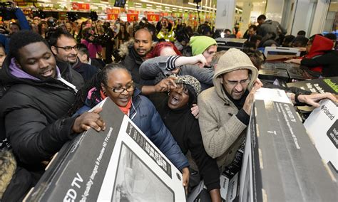 black friday uk shoppers fight  bargains  retail news newslocker