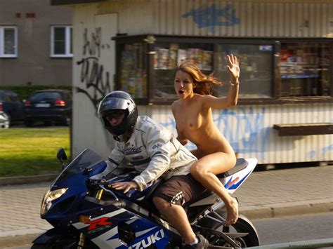 Nude Motorcycle Passenger Waving As Her Picture Is