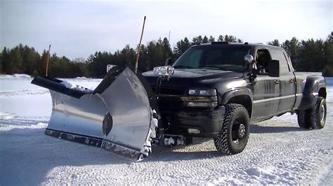 snow plowing silverado   snowdogg  plow pushing snow youtube