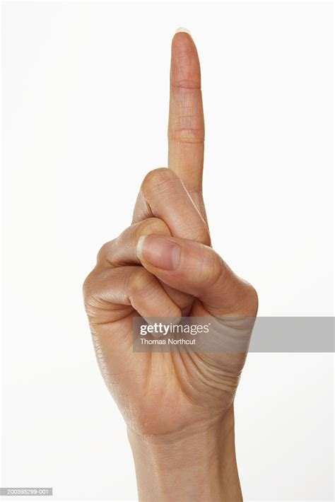 woman holding   finger photo getty images