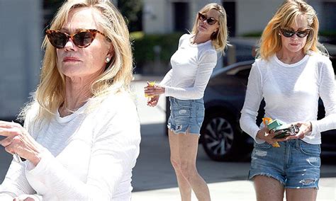 melanie griffith dons tiny denim shorts at gas station before moving into her first solo