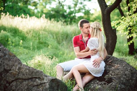 Couple In Love At A Picnic In A Park With Green Grass Stock Image