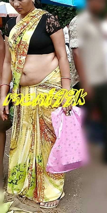 indian aunties and girls real life aunties saree side view revealing her tummy and deep navel